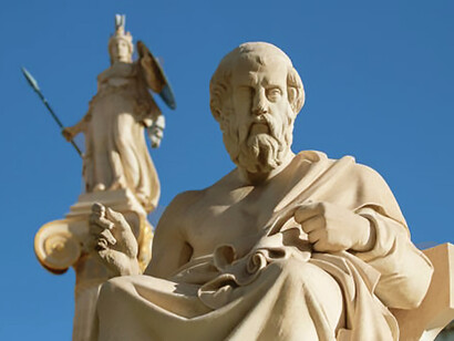 Composition of marble statue of Plato in front of the Athens Academy on Panepistimiou Ave