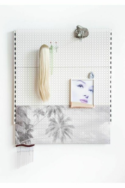 Gabrielle Beveridge, Post exertion visibility printed advertisement, 2013, crystal, wig, glass, wind chime, rock, pegboard, pegs, artist frame
