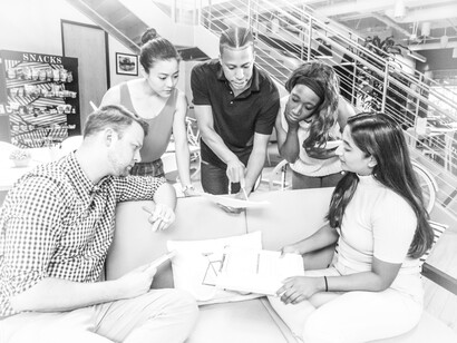The team expressing their different ideas and being flexible to hearing each other, each from different cultural backgrounds