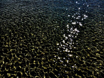 Gli parve di sentirlo quel mare caldo e piatto