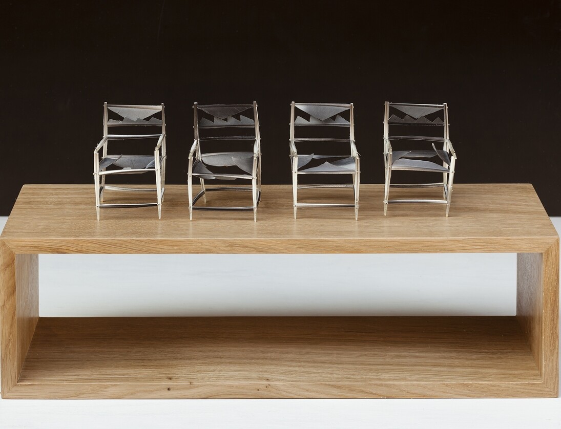 May Cornet, 'Feather Chairs', 2014, feathers and pins, 8 × 5 × 5 cm on oak plinth
