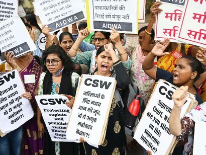 Women in India protesting and carrying "CSW" banners which stands for the United Nations Commission on the Status of Women whose  main global intergovernmental body dedicated to the promotion of gender equality and women's empowerment