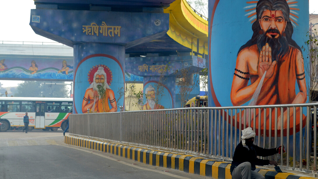 Pictures of Hindu saints from scriptures painted on intersection and the roadside pillars
