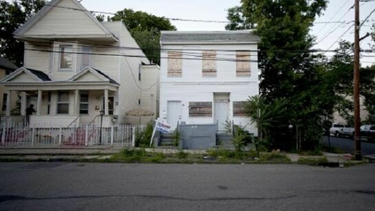 Street view of residences in Orange, New Jersey (by MOS Architects and team, assigned to The Oranges). Photograph courtesy of MOS Architects.
