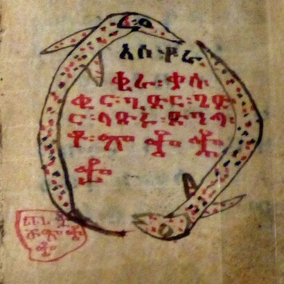 Libro di preghiere Ragouel con doppio Uroboro su pergamena. Orgine: Etiopia. 
Museo di Storia Naturale ed Etnografia, Colmar, Francia