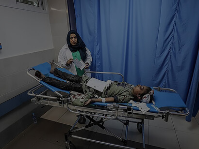 After an Israeli airstrike on October 11, 2023, wounded Palestinians at Gaza City's Al-Shifa Hospital await treatment in its crowded emergency ward