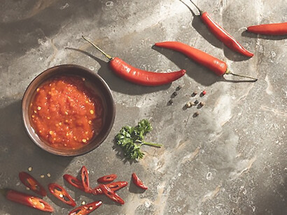 A meticulously arranged, delectable meal enhanced by the flavorful addition of sambal