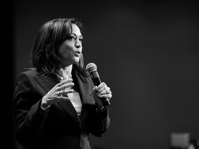 Kamala Harris speaking at a conference