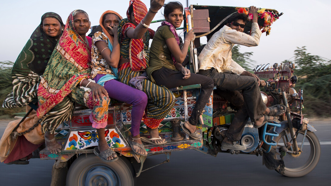 India's Gateway - Agricultural workers on bike © Tim Smith