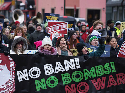 International Human Rights Day protest march against war and against deportations, USA