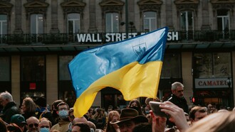 Ukrainian flag waving proudly in the streets of Kiev, Ukraine
