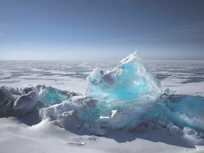 An ice cap once frozen is now melting as a result of climate change