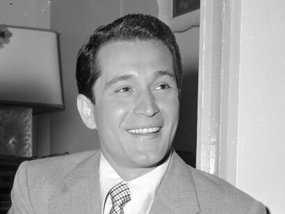 Perry Como fue un cantante de música popular, uno de los llamados crooners, actor y presentador de televisión estadounidense de origen italiano