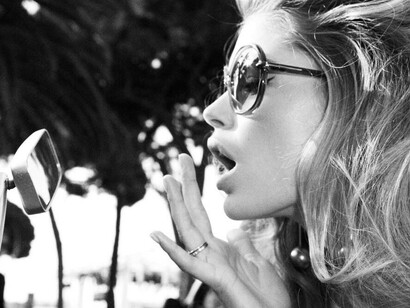 Kenneth Willardt, Inside Cannes, Doutzen looking at the rear mirror, 2011. Courtesy of The Selects Gallery