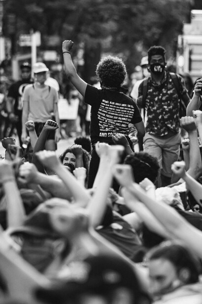 People protesting. There is a dividing line between left-wing and right-wing or neoliberal policies