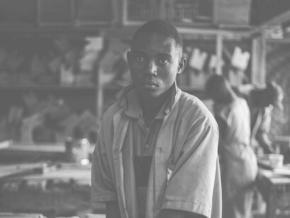 Young man works as a carpenter