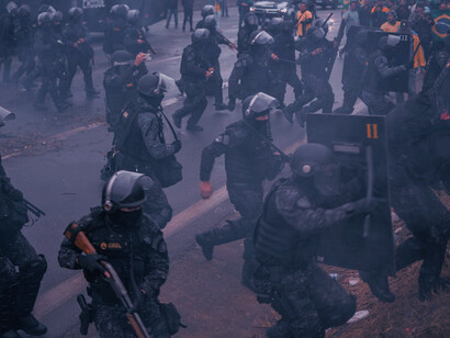 The thin blue line tainted with cruelty, the stark reality of police violence is fuelled by our species' capacity for brutality