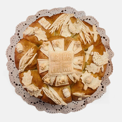 Bread and wheat represent sacrifice and ensure the protection of a household