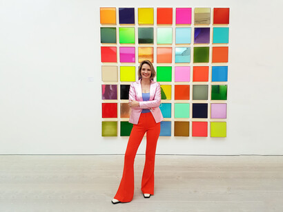 Artist Nat Bowen standing in front of her artwork. STARTnet fair, 2020, Saatchi Gallery © Irene Kukota