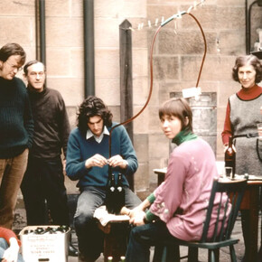 NSW Government Astronomer and Director of Sydney Observatory Harley Wood bottling wine in the Observatory courtyard with family and friends, 1972. Courtesy of Powerhouse
