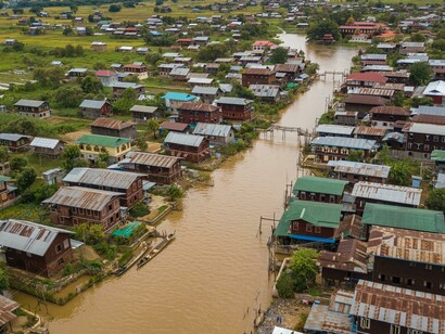 Flooded neighborhood in Myanmar seen from above — a consequence of climate change