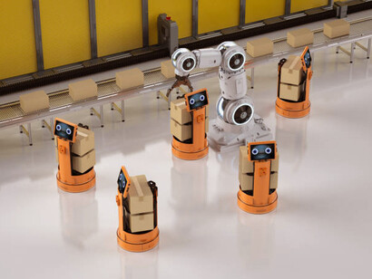 Factory automation concept with a robot arm working alongside a warehouse robot