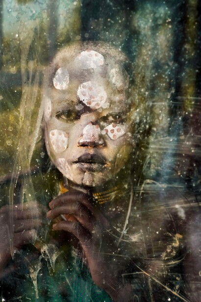 Steve McCurry, Ritratto di un ragazzo della tribù Suri, Omo Valley, Ethiopia, 2013