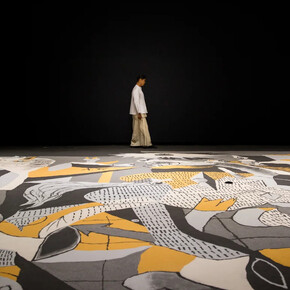 Lee Mingwei, Guernica in sand, view of performance. Courtesy of M+ Museum