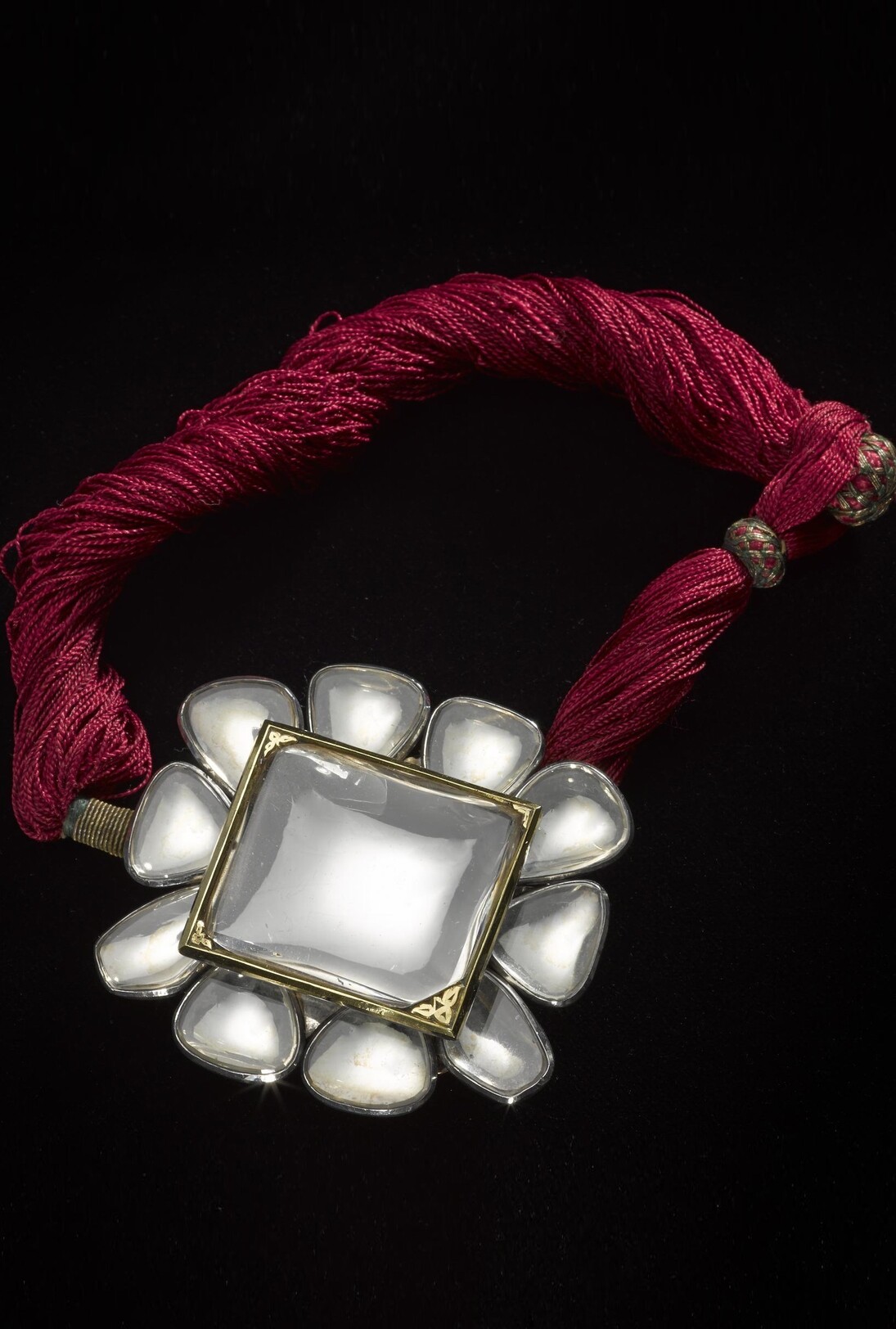 Armlet composed of a central rock crystal and ten smaller stones set in silver, Northern India, 1800-1850 © National Museums Scotland
