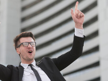 A successful businessman exuding happiness