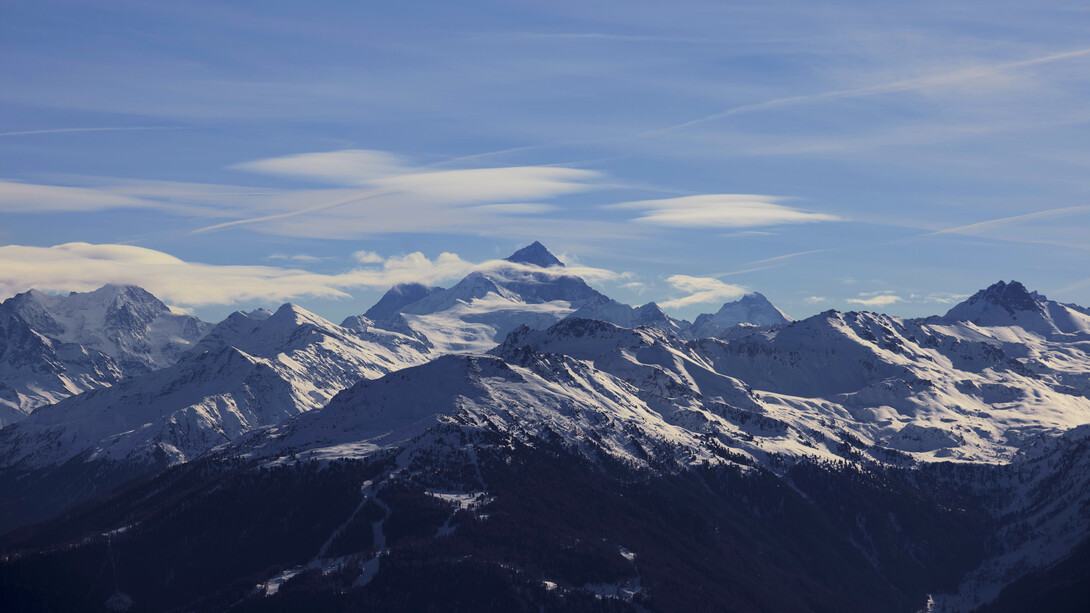 The landscapes of Six Senses Crans-Montana, situated in the Valais canton of Switzerland, showcase the snowy peaks of the Swiss Alps