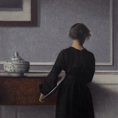 Vilhelm Hammershoi. Interior con joven de espaldas. 1904