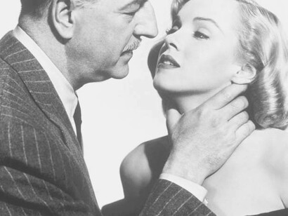 Marilyn Monroe being chocked by her "Daddy"
