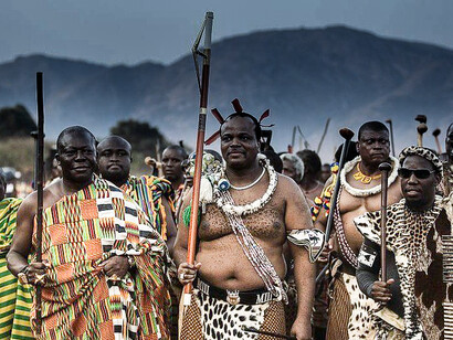 King Mswati III and his tribe. Swaziland is a small developing nation in Southern Africa. The capital is Mbabane. This makes it the 7th smallest country in Africa and ranking 159th worldwide