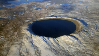 Un cratere originato dalla caduta di un meteorite © NASA Denis Sarrazin
