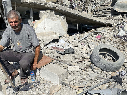 Child amidst the ruins following the 2009 Gaza War