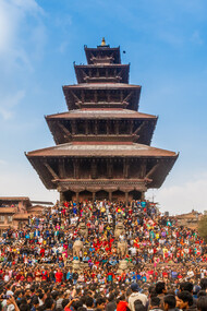 Crowds gather at the Nyatapola Temple in Bhaktapur, Nepal, to watch the vibrant Biskaa Jatra festival