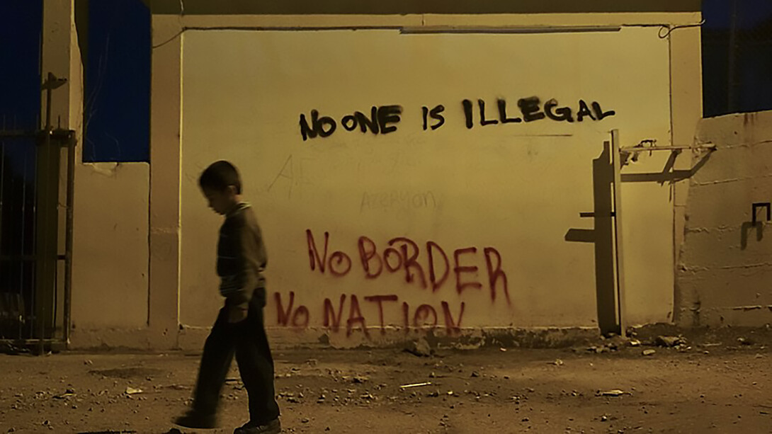 Underaged refugee in a camp located at the northeastern Greek island of Lesbos, 30 January 2016