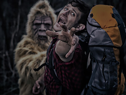 Thrilling depiction of Bigfoot chasing a camper through the woods