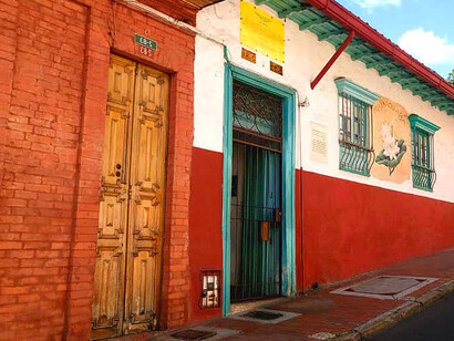 The vibrant streets of the colonial neighbourhood are alive with colour, showcasing the charm of its beautifully preserved houses in Bogotá, Colombia