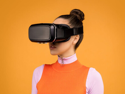 Wearing VR goggles, she’s on the cutting edge of entertainment technology, where AI creates lifelike, interactive experiences that were once the stuff of science fiction