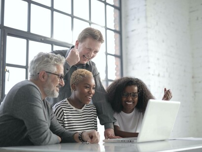 Colleagues at work becoming friends with time