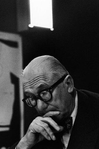 René Burri,Le Corbusier and his "Modulor" in his office, 35 rue de Sèvres. Paris, France, 1959 © René Burri / Magnum Photos. Courtesy of Casa dei Tre Oci