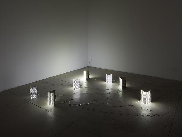 Installation view, The Host and the Cloud (mask), 2010, Led, Brass, Elastic, Hand Controller and  custom box packaging
5 7/8 X 6 1/4 X 9 1/2 in. ( 15 X 16 X 24 cm )
Photo: Guillaume Ziccarell