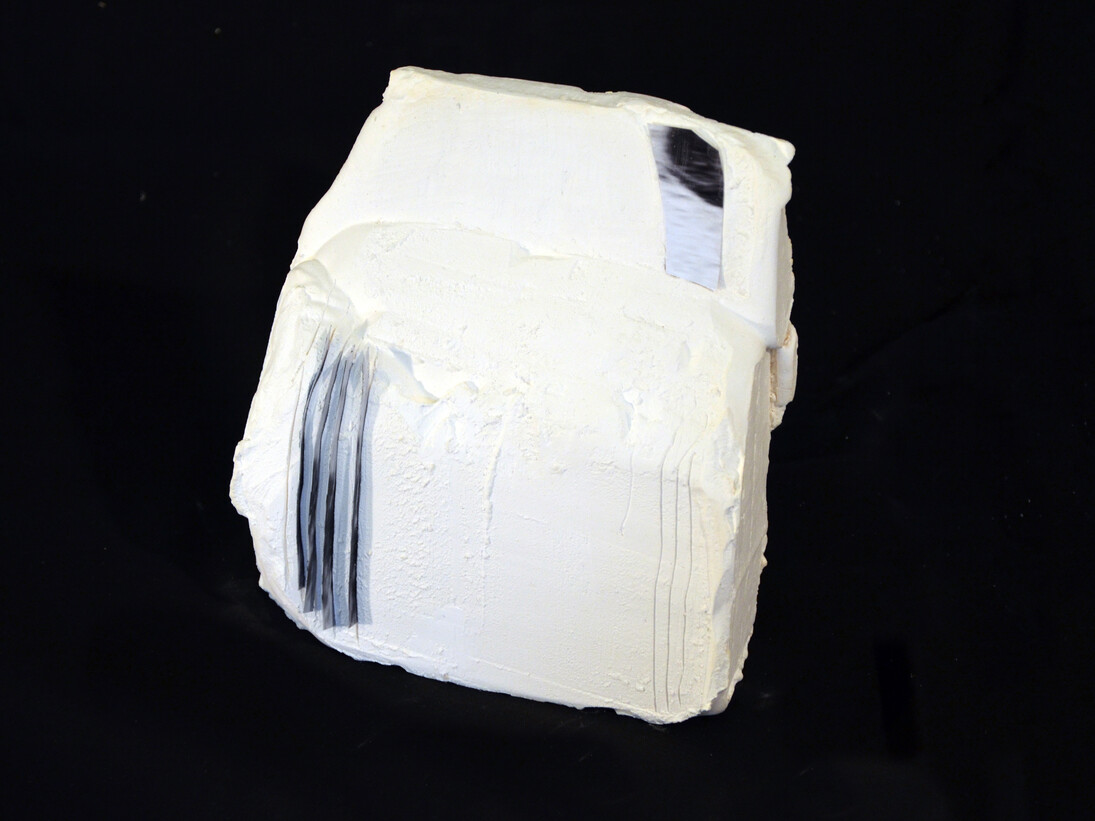 Kara Rooney, On Moving Farther Away From Speech, or Hindsight is Twenty/Twenty, No. 5, 2014, Plaster and ceramic with digital photograph, 6 ¾ x 6 ¾ x 2 ¼ inches, Copyright Kara Rooney. Courtesy Driscoll Babcock Galleries  
