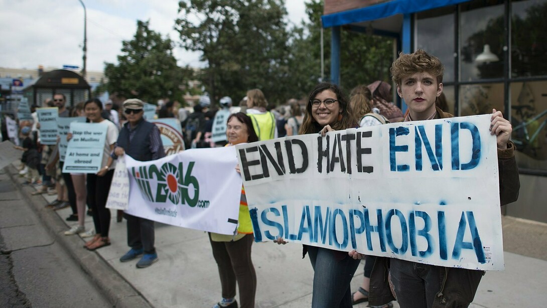 People rally against hate speech and Islamophobia in response to hate crimes in Minneapolis, Minnesota, 2016