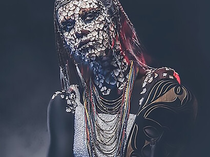 Close-up portrait of a witch from the indigenous african tribe, wearing traditional costume