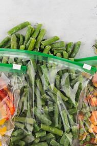 Sustainability in your kitchen by storing foods in reusable silicone bags, an eco-friendly alternative that promotes waste reduction and convenience