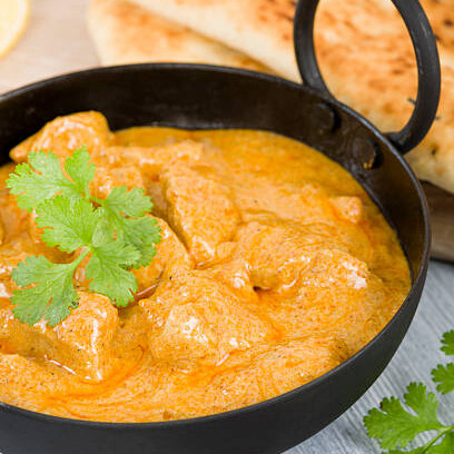 Korma is a rich, flavorful dish made by braising meat or vegetables with yogurt, water or stock, and a blend of aromatic spices to create a thick, silky gravy