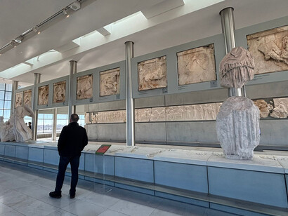 View of the third-floor exhibition space, Acropolis Museum, Athens, Greece, with a detailed view of the Parthenon pediment, frieze, and metopes on display